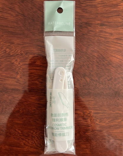 Safety folding eyebrow and face razor